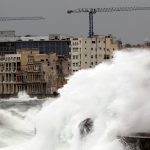 Waves crash against the seafront boulevard El Malecon ahead of the passing of Hurricane Irma, in Havana